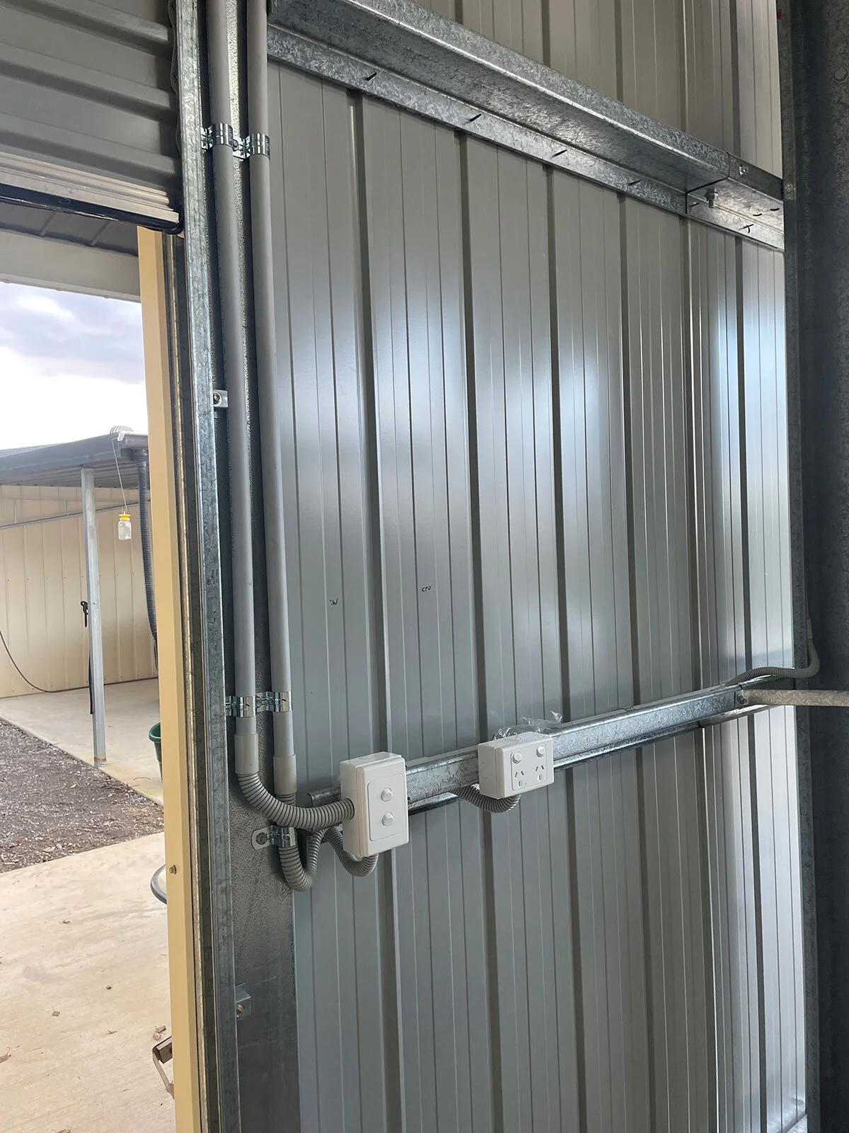 installed power points and conduit in shed